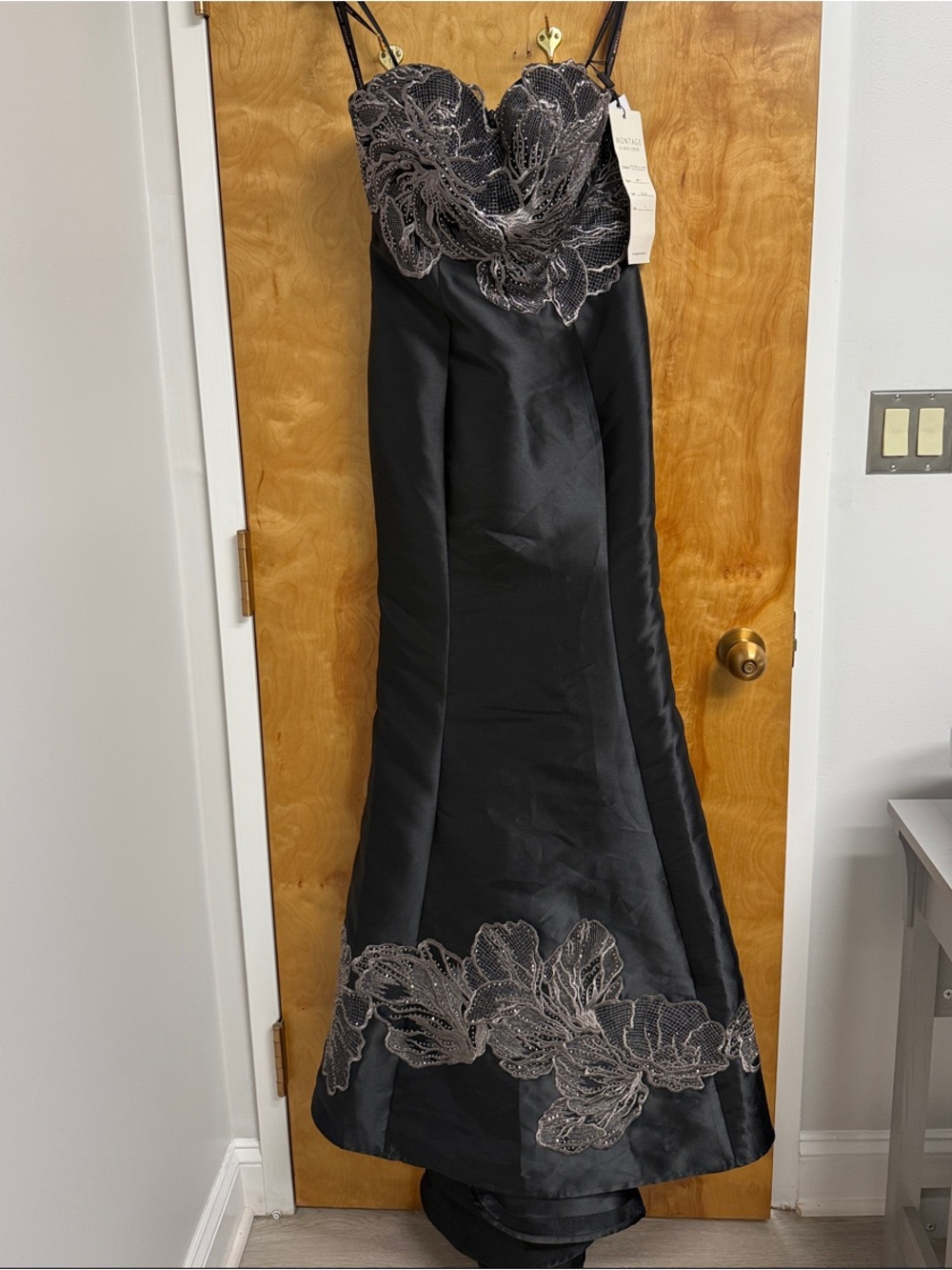 Black Strapless Evening Gown with Silver Lace Appliqué Montage by Mon Cheri